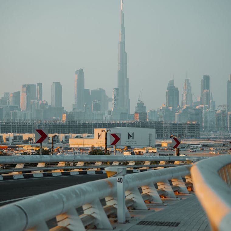 The Burj Khalifa above the Dubai skyline at sunset